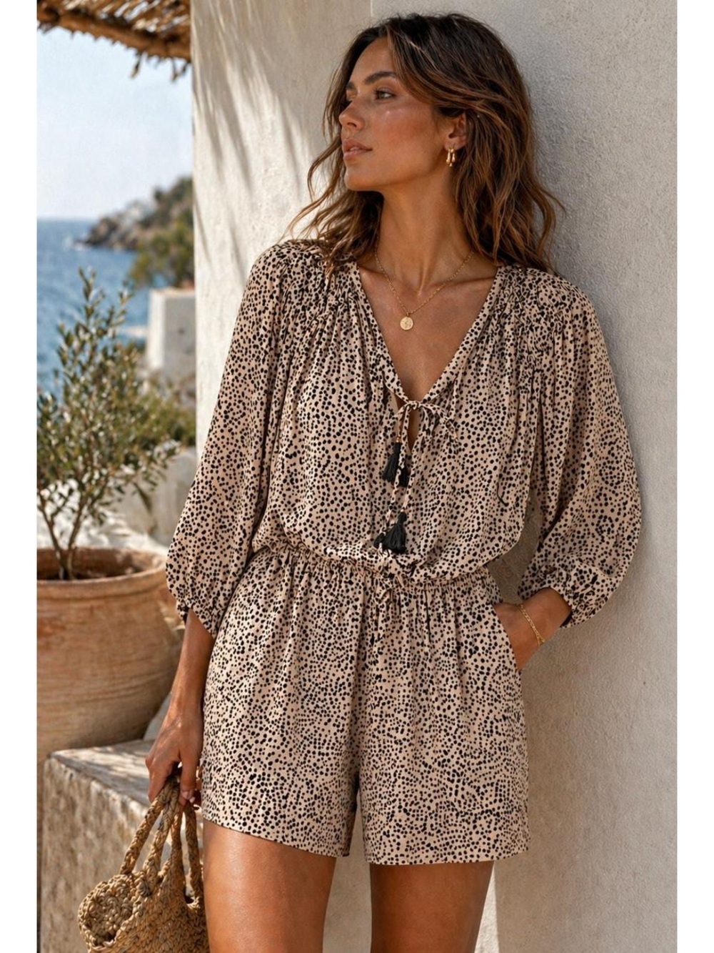 Anthropologie Beach Gold Beige and Black Printed Tassel Romper